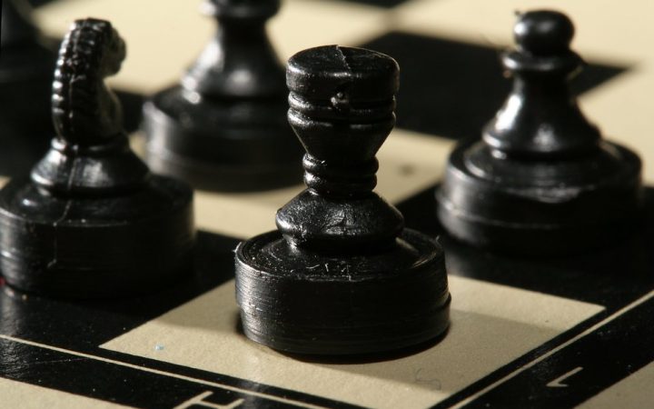 7552-close-up-of-a-miniature-black-chess-rook-piece-pv